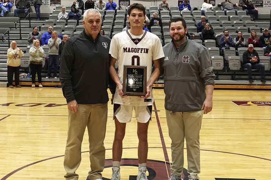 Russell honored for scoring 1,500th career point